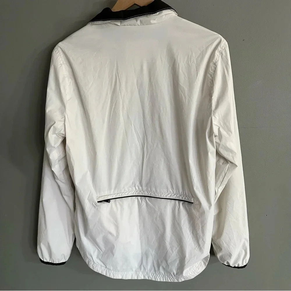 Hollister White windbreaker zip up. Small‎